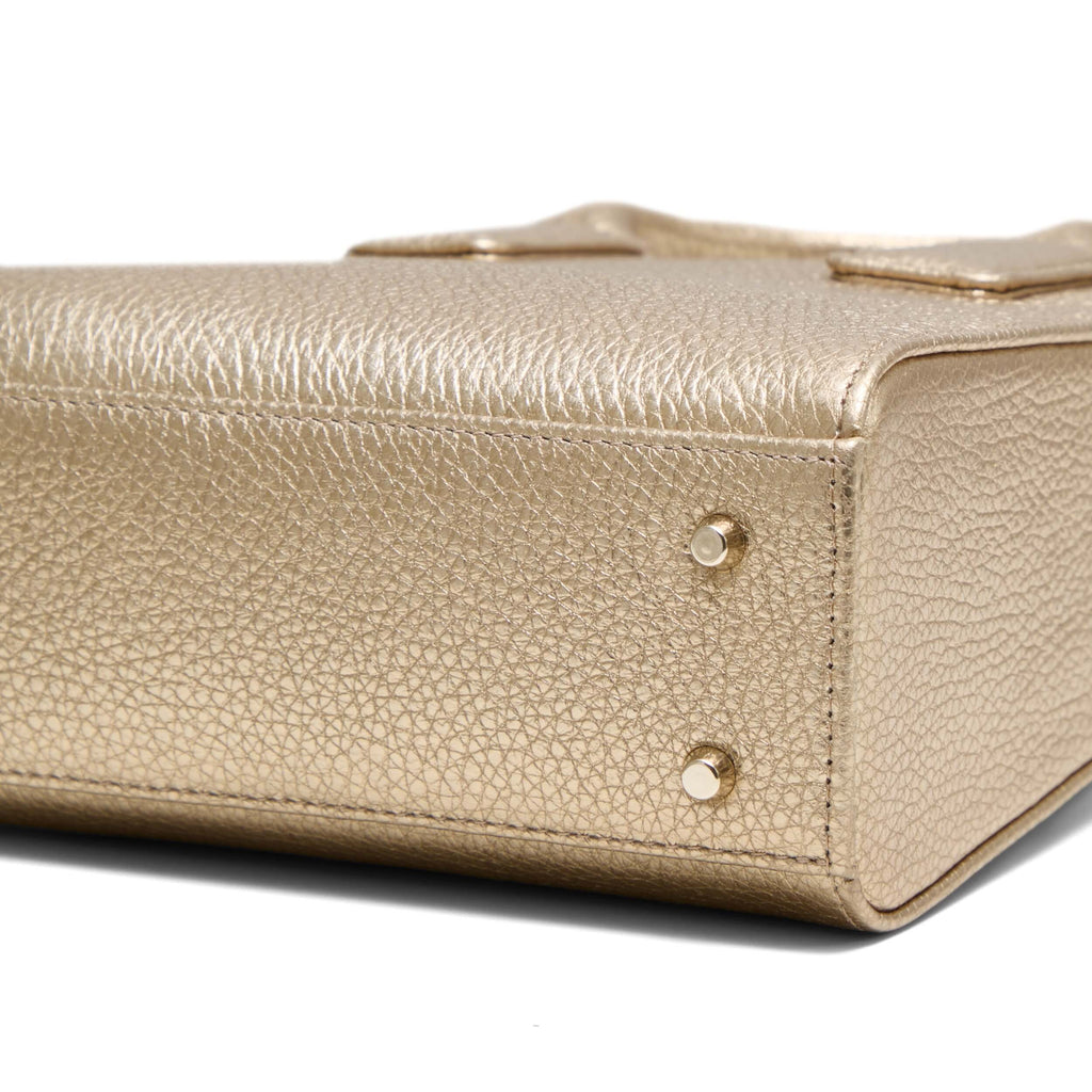 <tc>Mini Q Oro</tc>